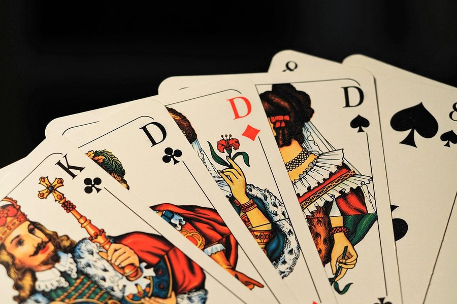 Playing cards fanned on a hosted table
