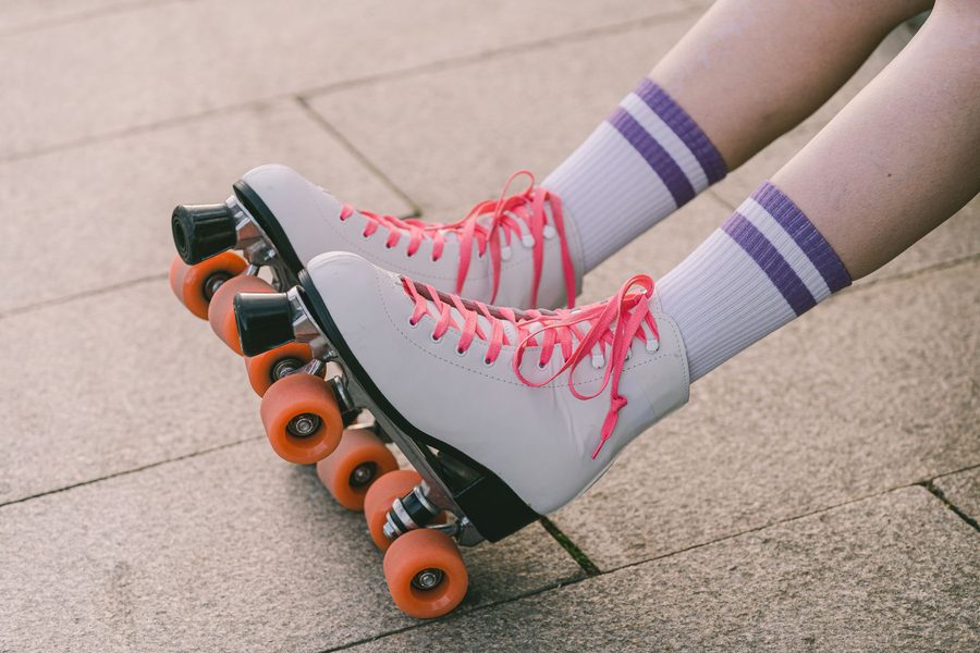 Retro roller skates with pink laces